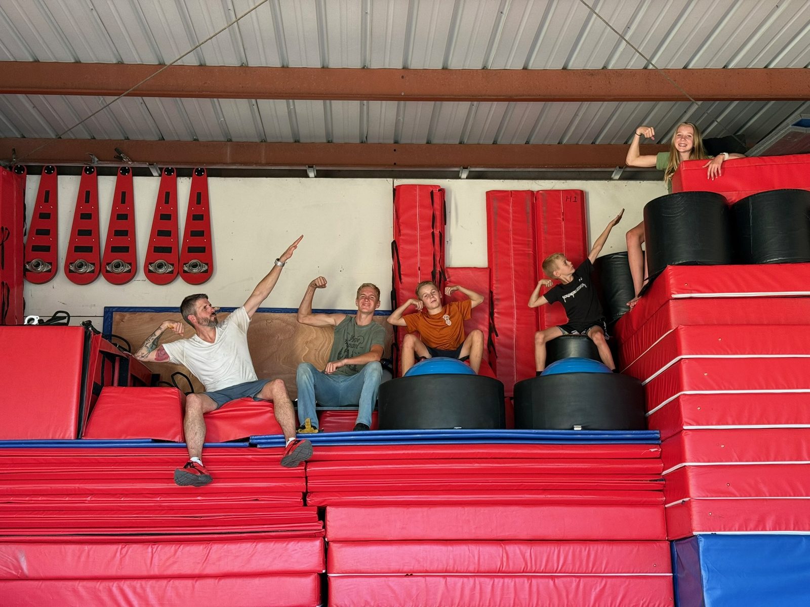 Kids training on ninja warrior obstacles during a class at Lightning Ninja Academy
