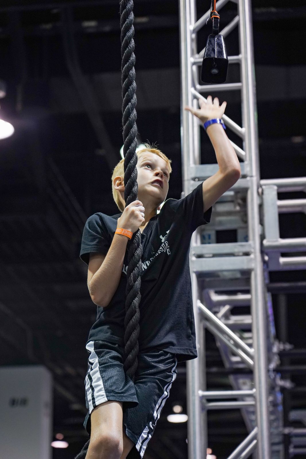 Young athlete conquering an obstacle at Lightning Ninja Academy in Roseville